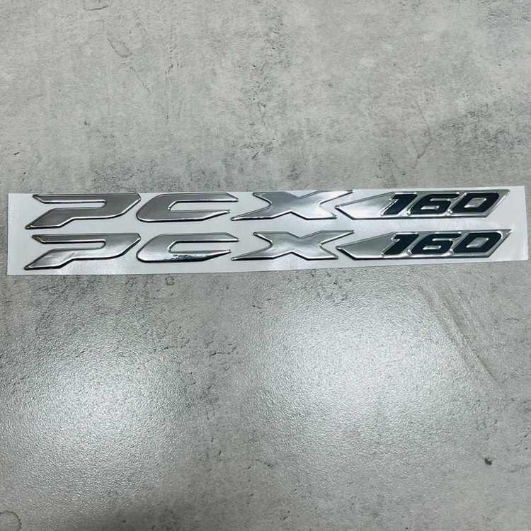 آرم روی بدنه و دستگیره موتور سیکلت وارون مدل آبکاری کد L-40 مناسب برای هوندا PCX 160 بسته 2 عددی