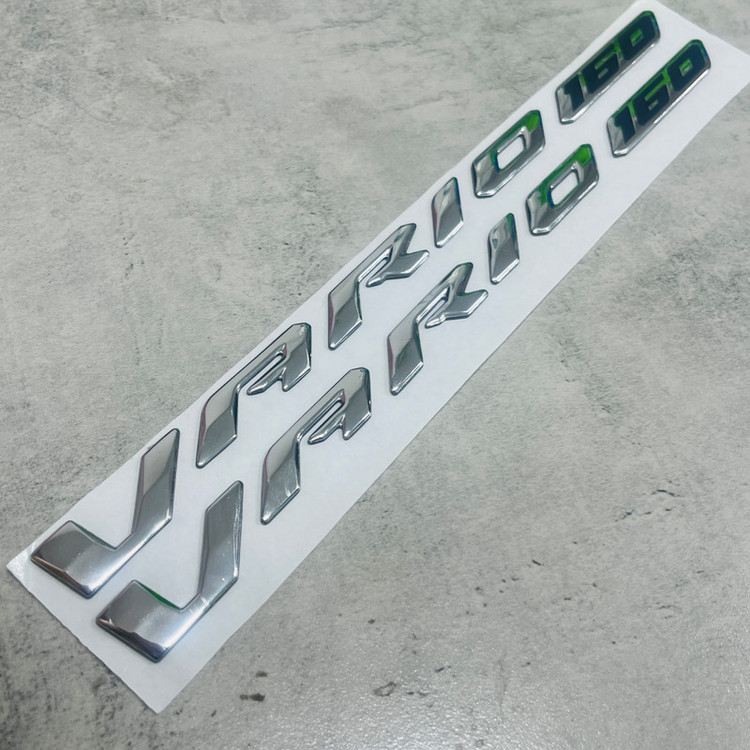 آرم و نوشته موتور سیکلت وارون مدل برجسته کد A-115 مناسب برای واریو 160 بسته 2 عددی